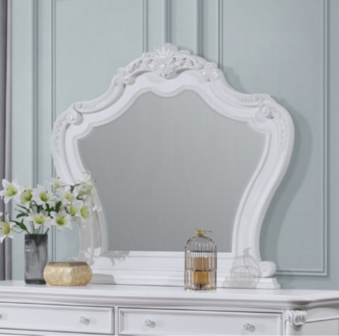 Ornate white vanity mirror with carved frame and rococo detailing