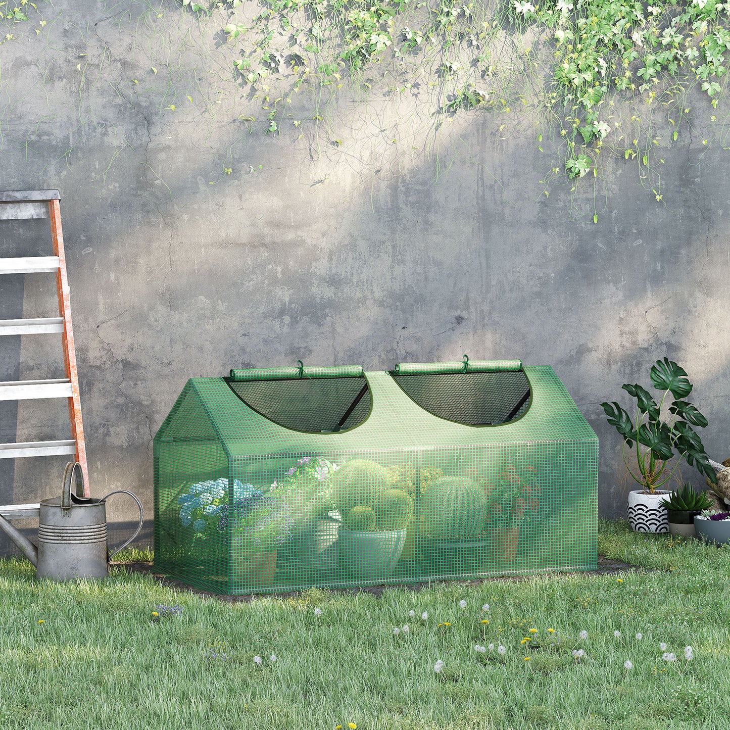 Green walkin greenhouse for small plants featuring double rollup doors and mesh cover