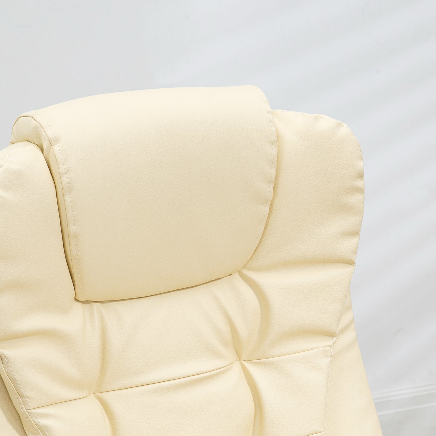 Cream faux leather office chair headrest with tufted detailing