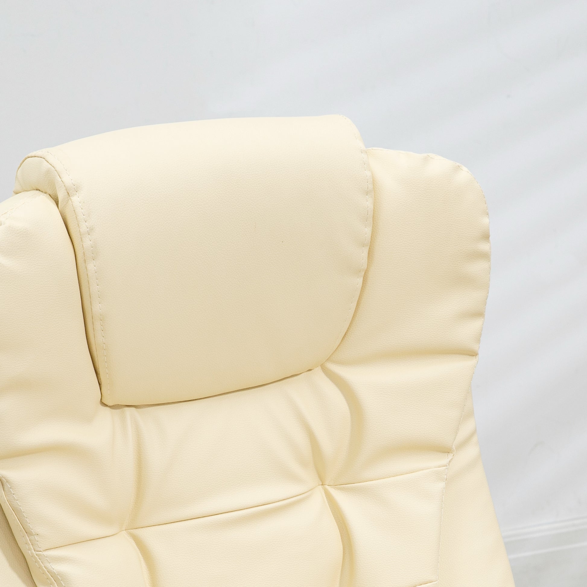 Cream faux leather office chair headrest with tufted detailing