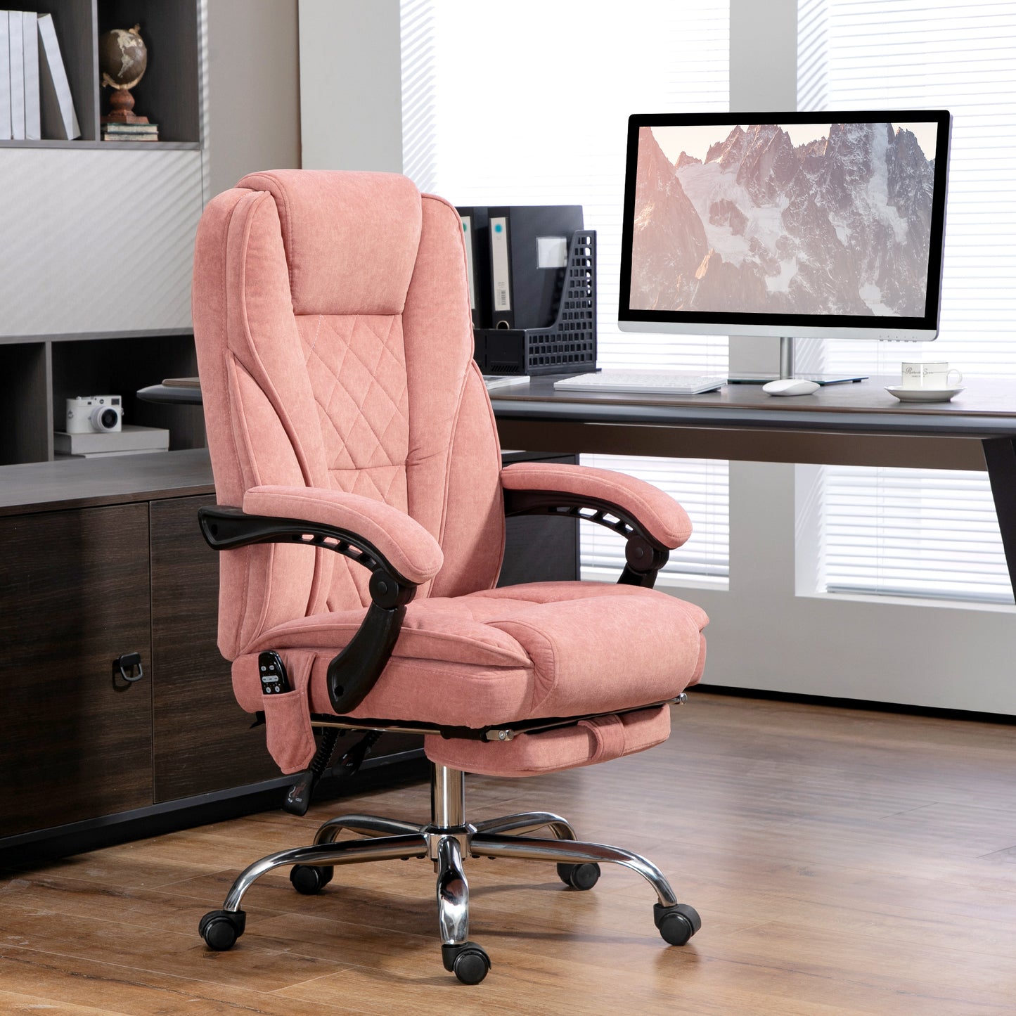 Ergonomic pink executive office chair with footrest for comfortable home office use