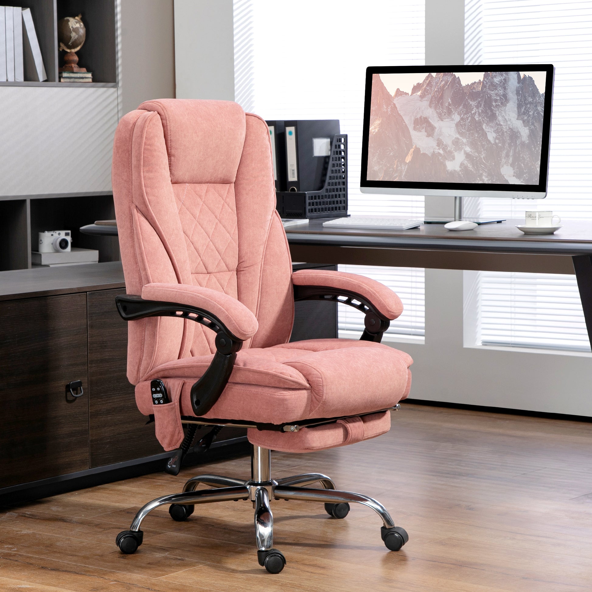 Ergonomic pink executive office chair with footrest for comfortable home office use