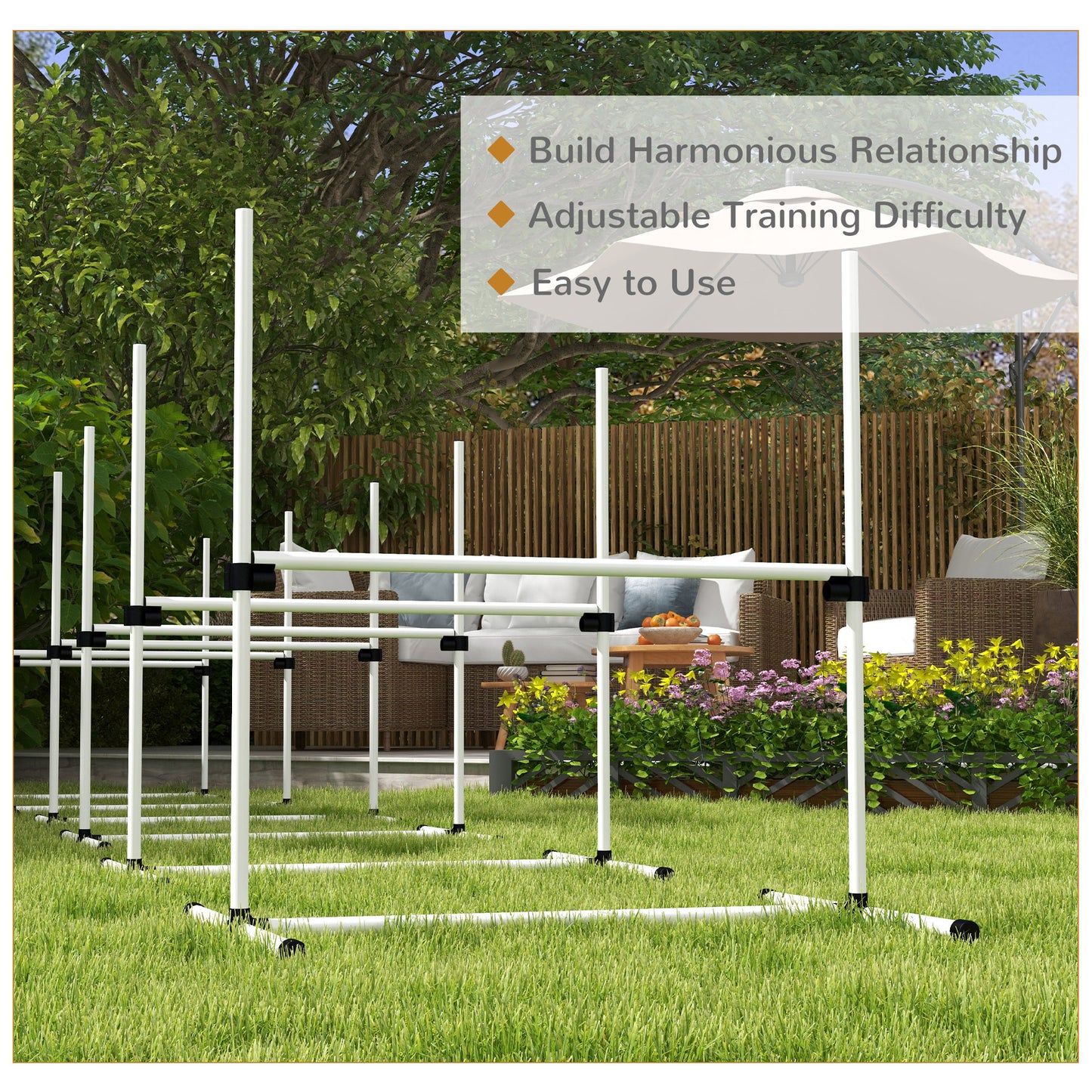 White PVC dog agility poles set up on a grassy lawn for training