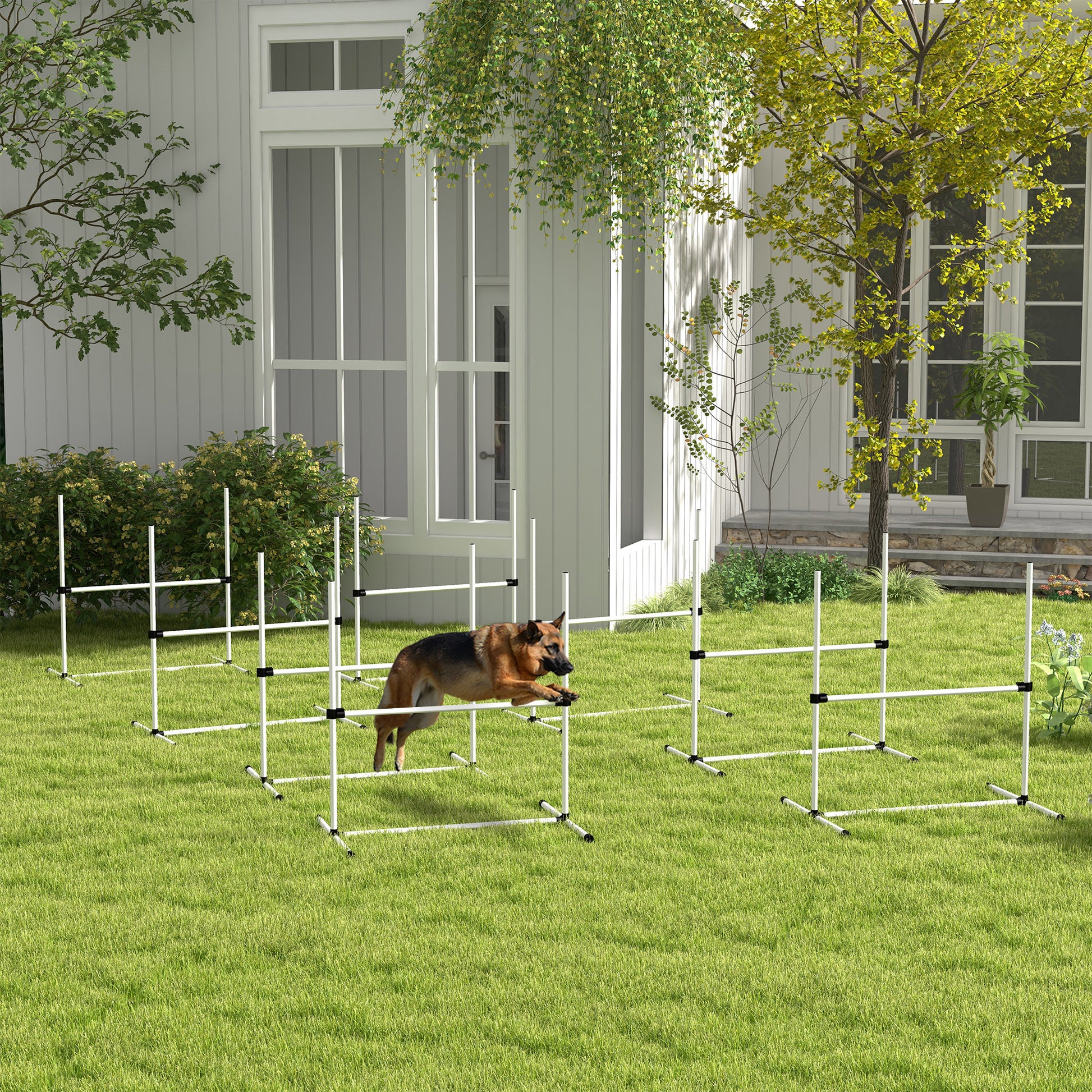 German Shepherd dog jumping over agility training bar obstacle in a backyard