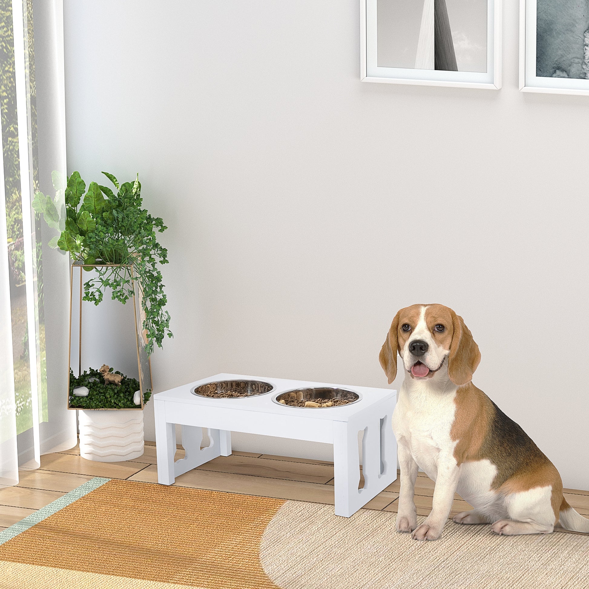 White wooden raised dog bowl feeder with two stainless steel bowls filled with kibble