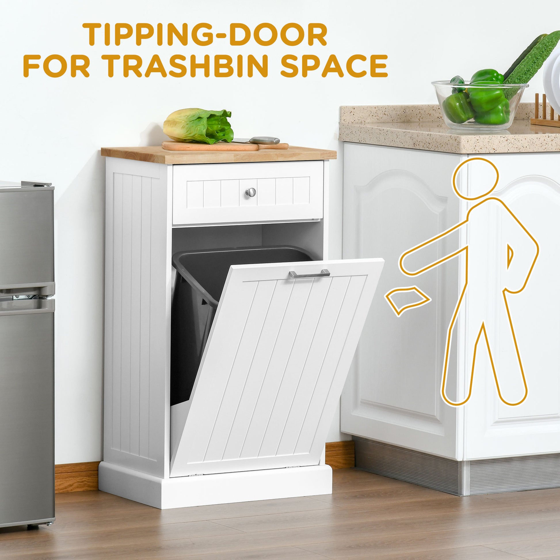 White tippingdoor trash cabinet with natural wood top in kitchen