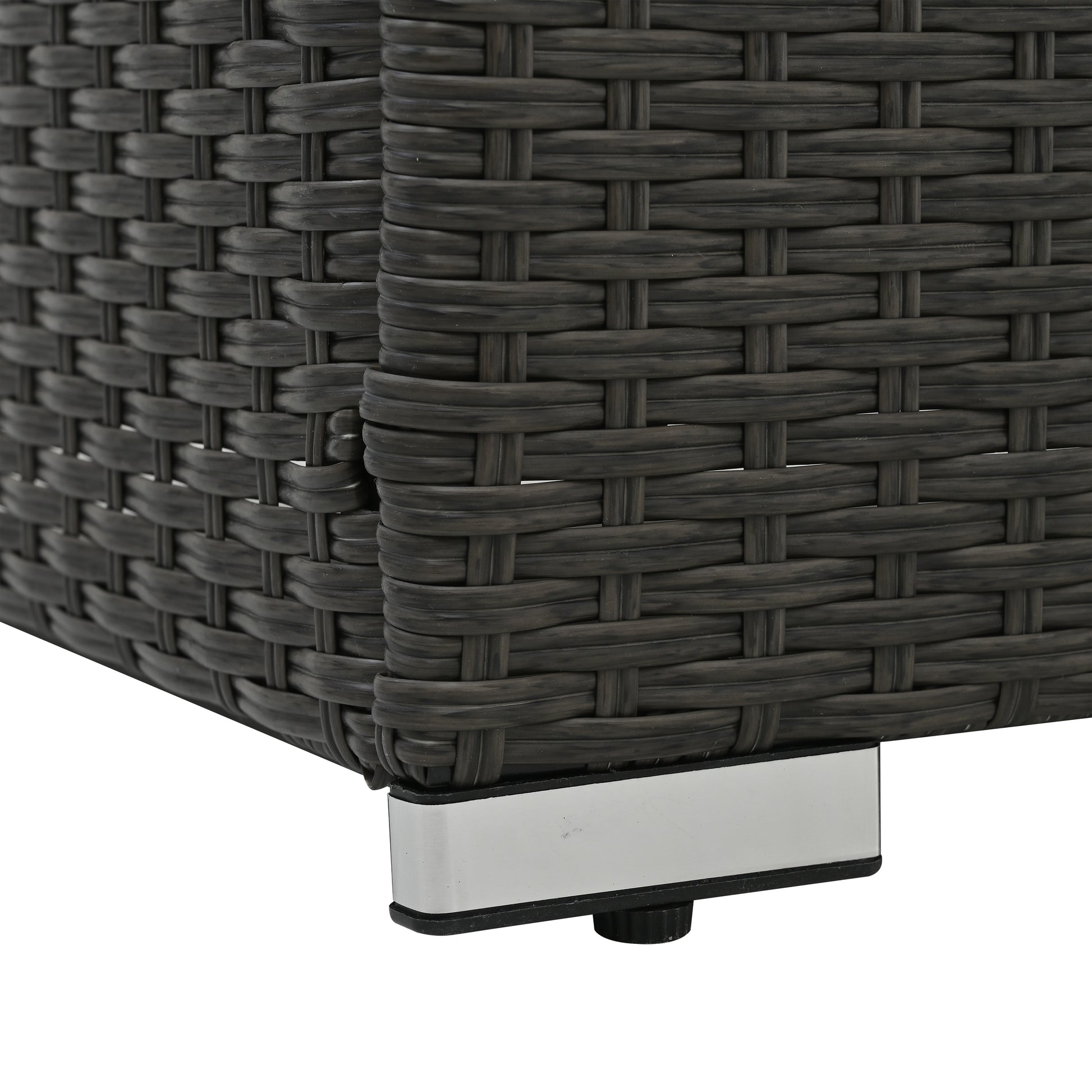 Dark gray wicker furniture corner with brushed metal leg and adjustable foot