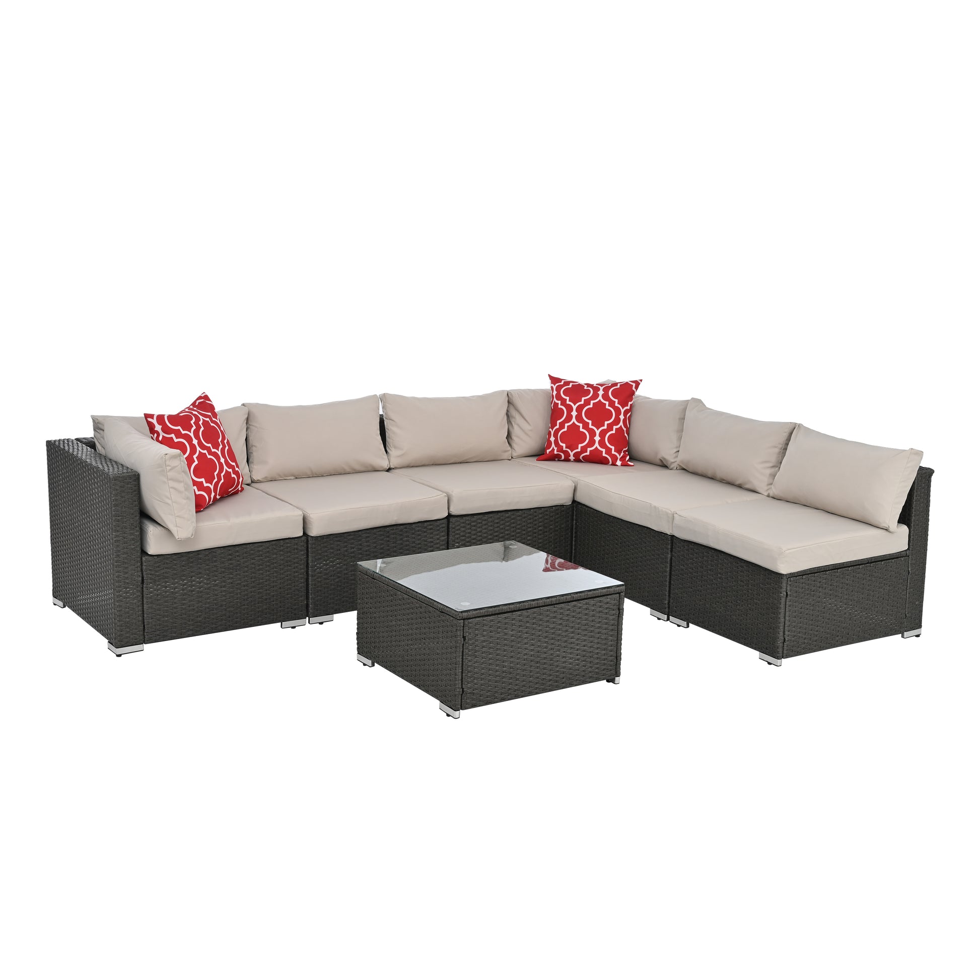 Dark gray rattan sectional outdoor sofa with beige cushions and red patterned pillows