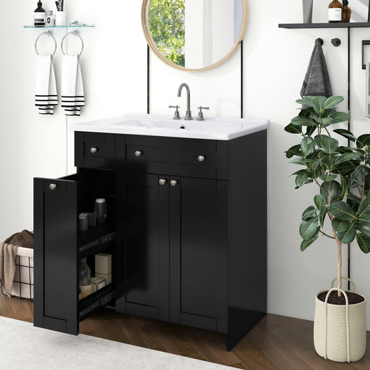 Black bathroom vanity with white ceramic sink and silver hardware open drawer reveals storage