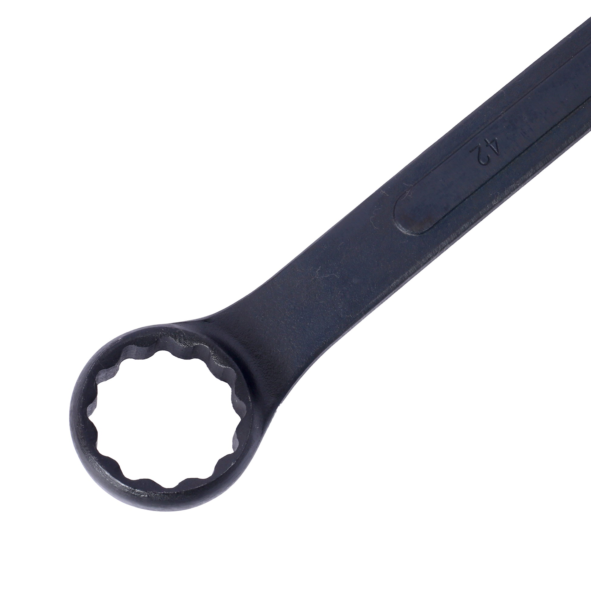 Closeup of a black steel mm ratcheting wrench with a textured grip and a twelvepoint socket