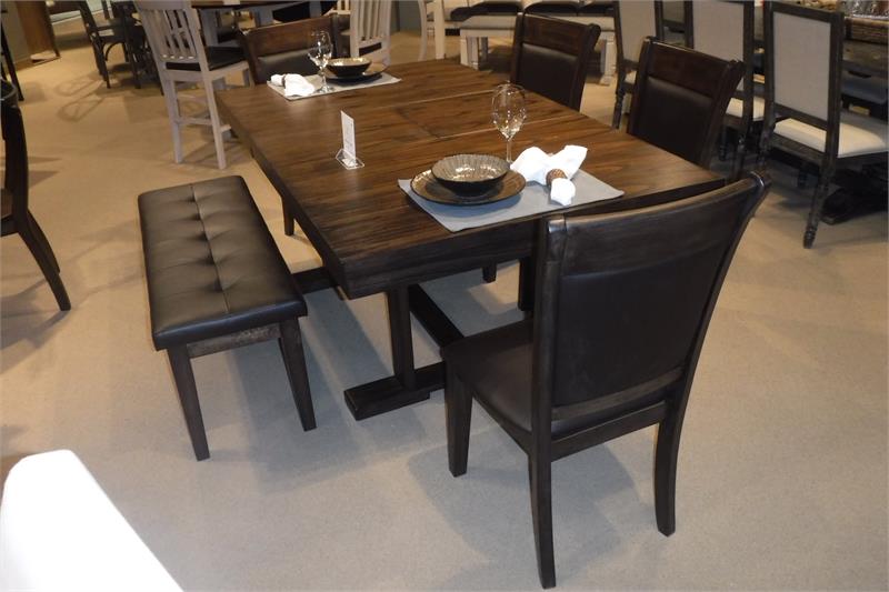 Dark wood dining table with tufted faux leather bench