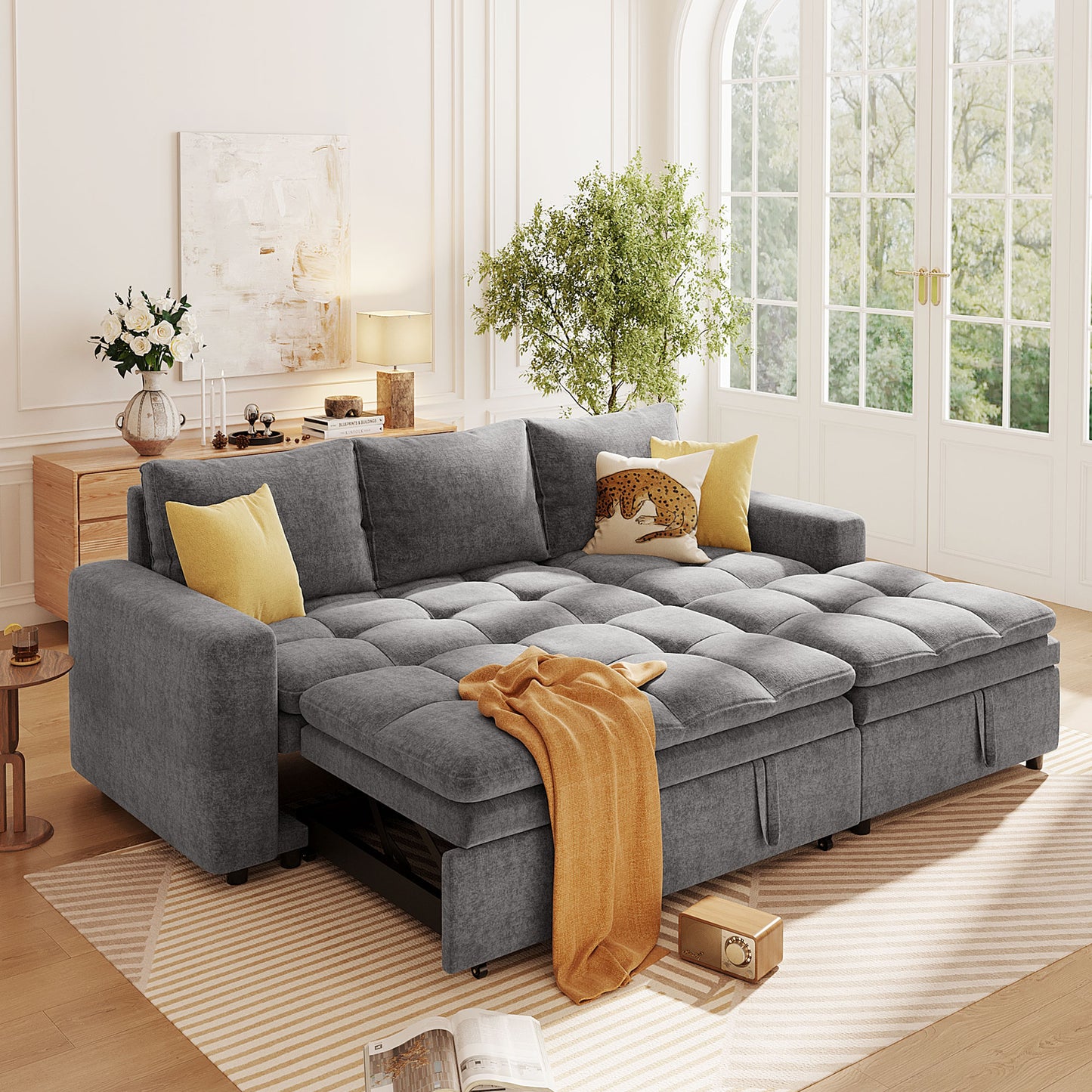 Grey fabric sectional sleeper sofa with tufted cushions and pullout bed feature