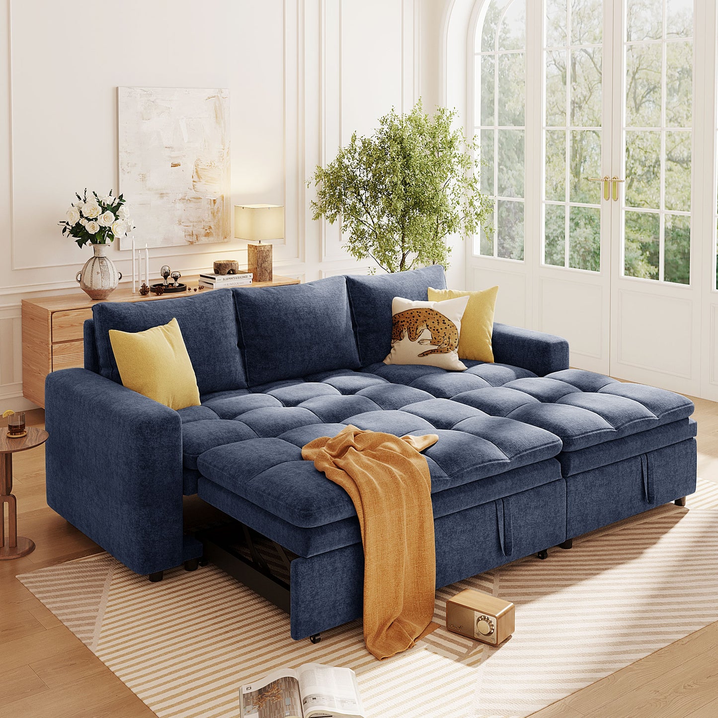 Deep blue sectional sofa with tufted cushions and orange throw featuring hidden storage