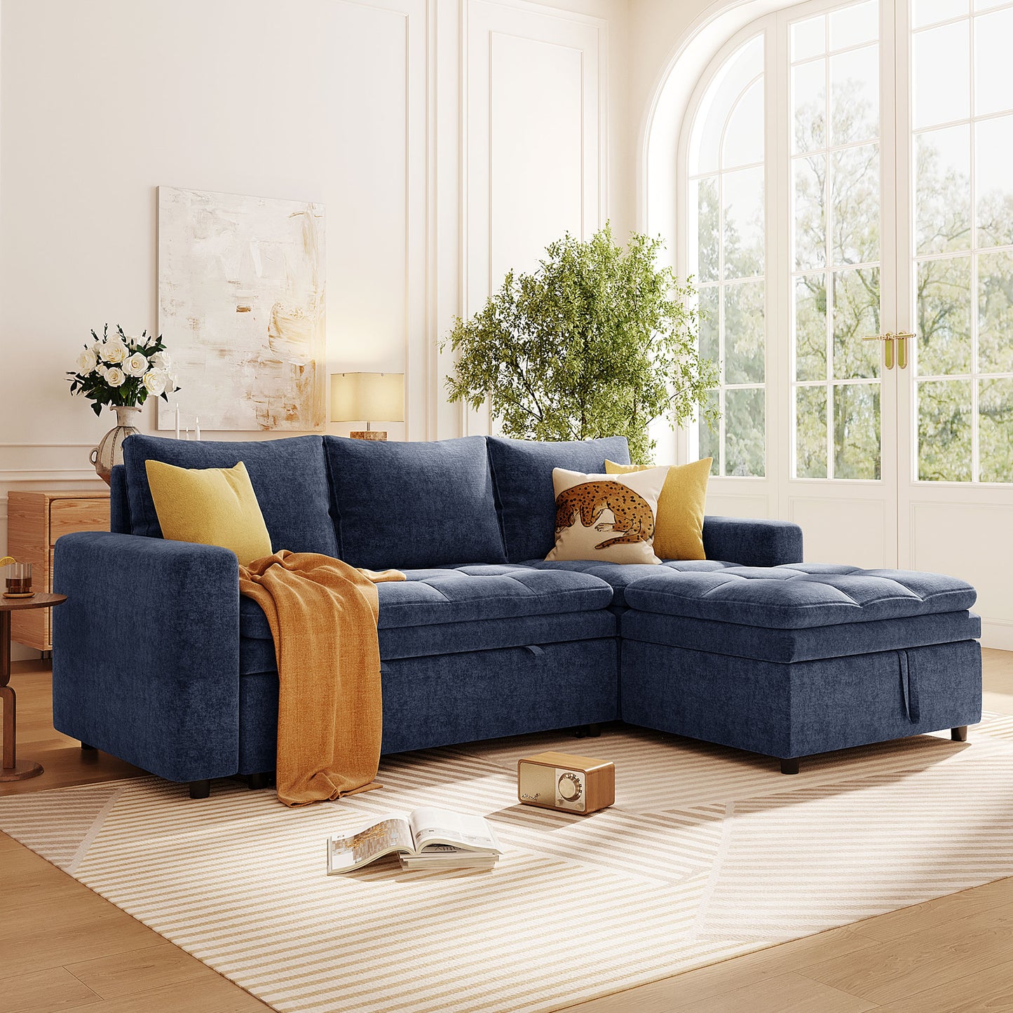 Deep navy blue sectional sofa with tufted cushions and storage chaise