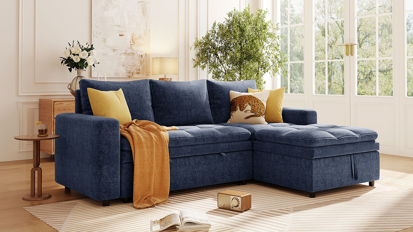 Deep blue sectional sofa with storage chaise tufted cushions and orange throw
