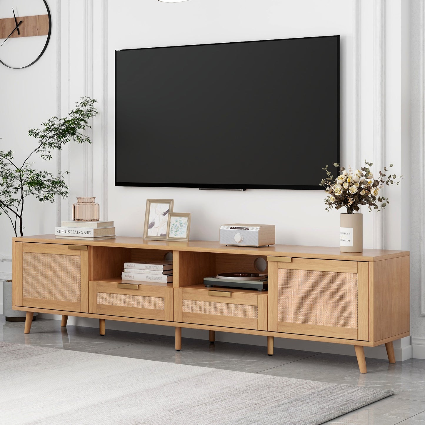 Modern light oak TV stand with woven cane cabinet doors and gold handles