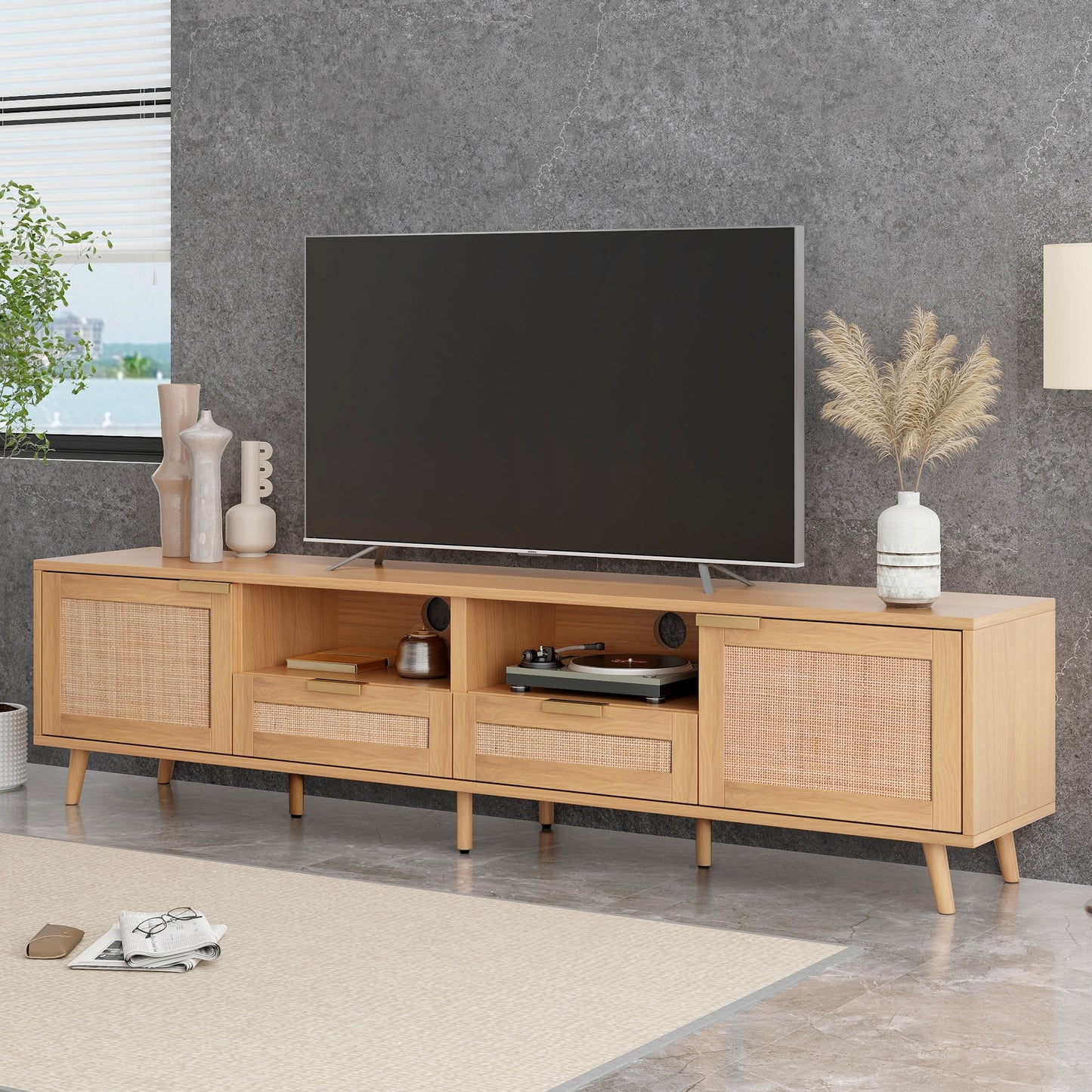 Light oak TV stand with rattan cane cabinet doors and gold handles