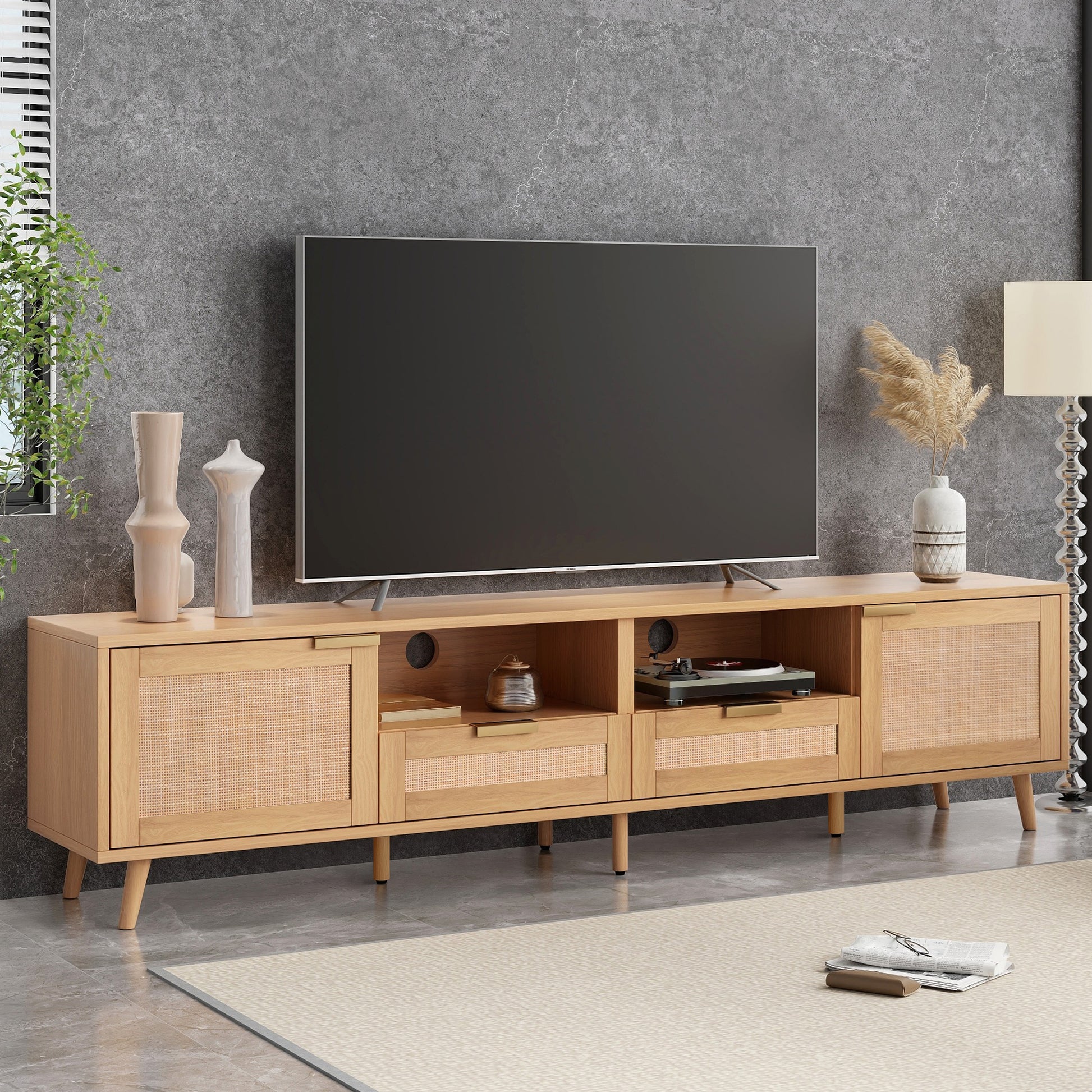 Light oak media console with cane doors and gold hardware perfect for modern living rooms
