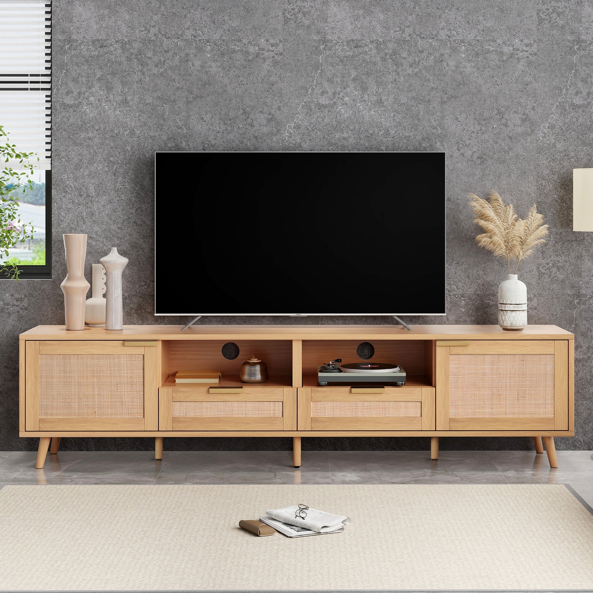Light oak media console with rattan cabinet doors and ample storage space
