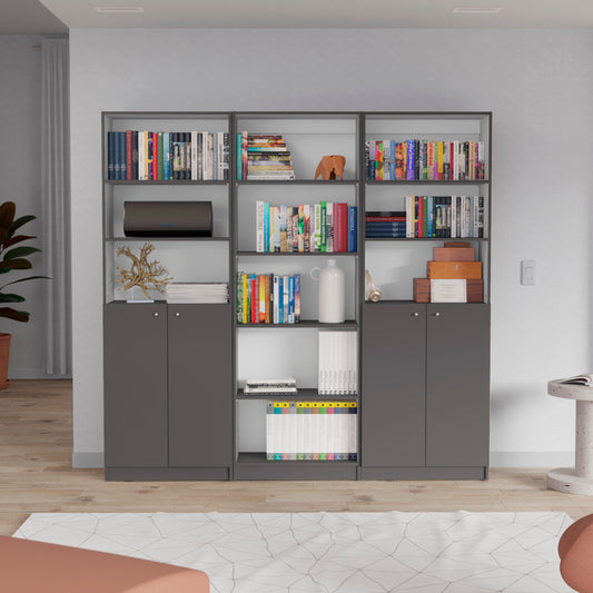 Modern gray modular bookshelf with various books and decorative items