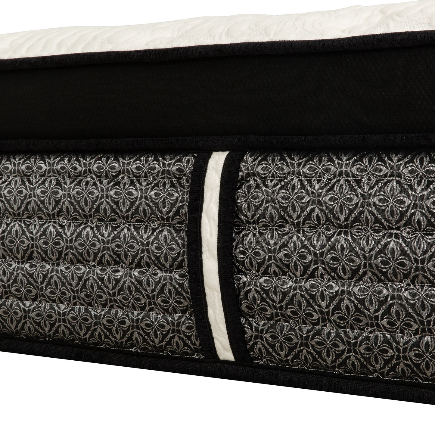 Black and white quilted mattress with intricate damask pattern soft fabric border