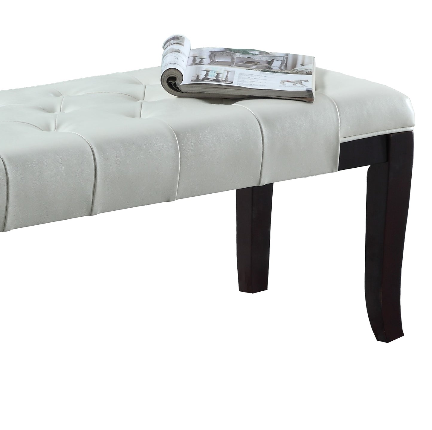 White faux leather tufted bench with dark wood legs