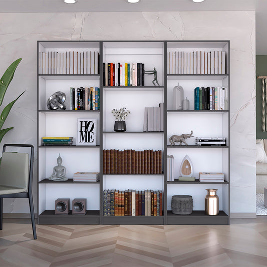 Grey modern bookshelf filled with assorted books and decorative items