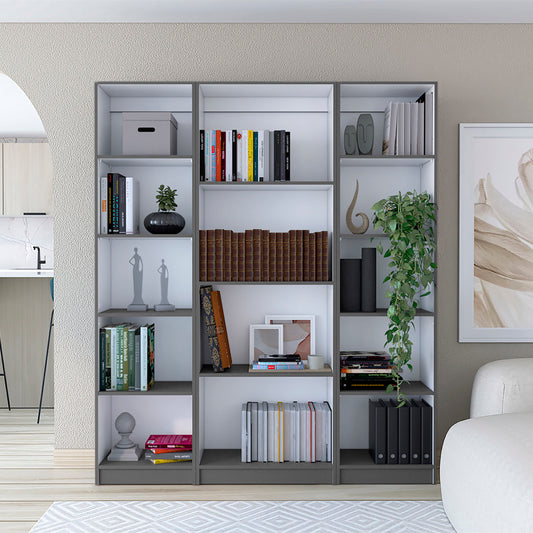 Gray and white modern bookcase filled with books decor and binders