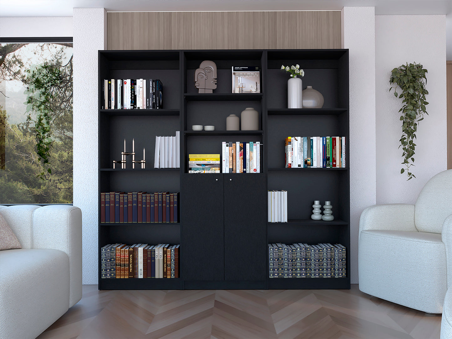 Modern black bookshelf filled with books sculptures and vases