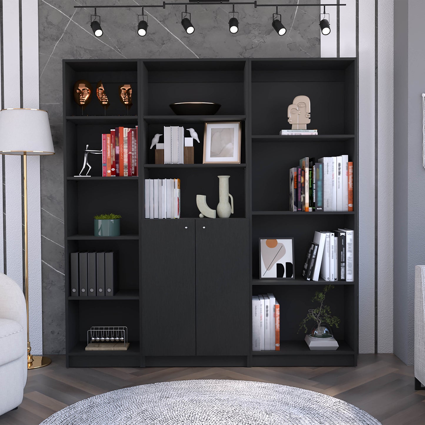 Black modern bookshelf unit with decorative sculptures and books