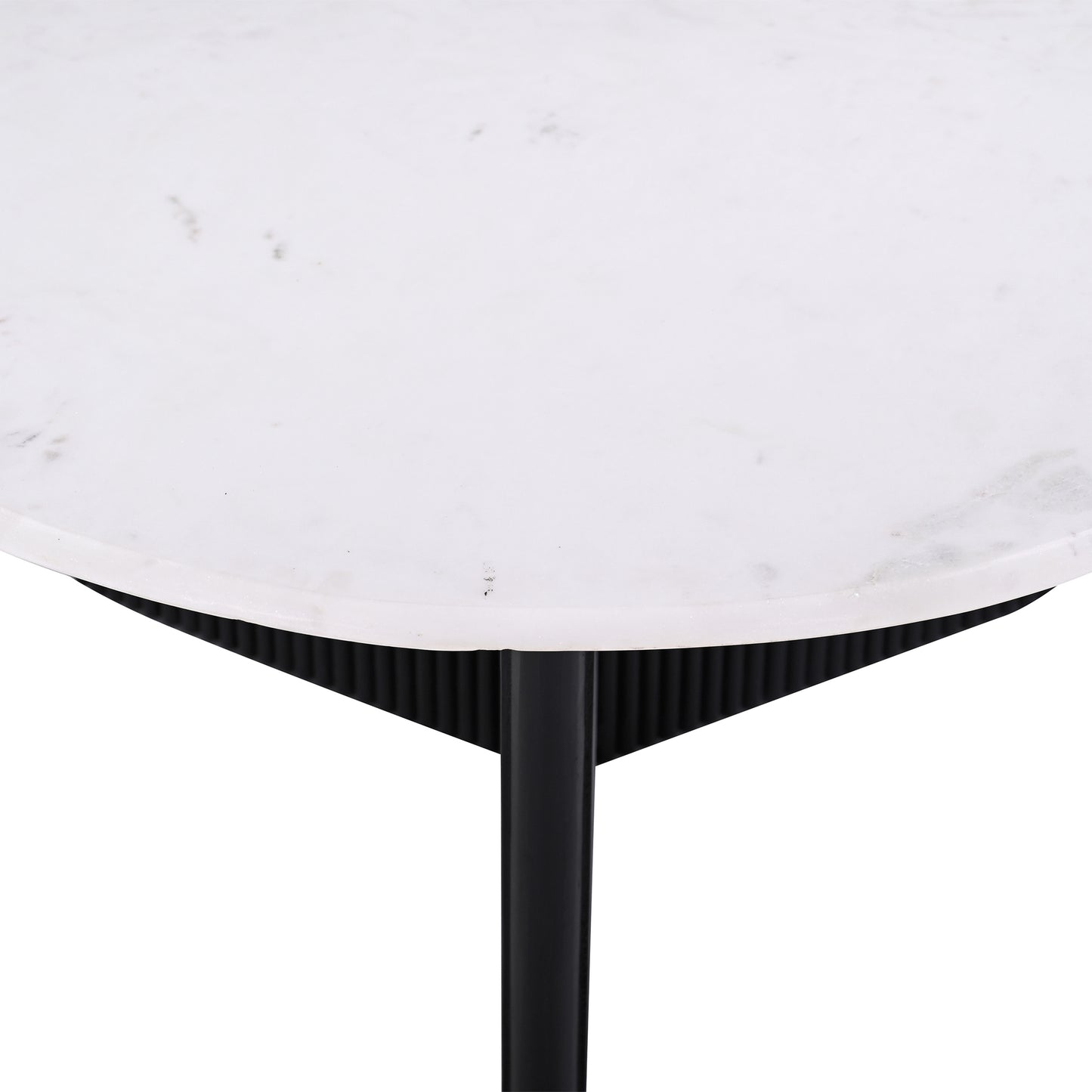 Modern white marble tabletop with black ribbed pedestal base