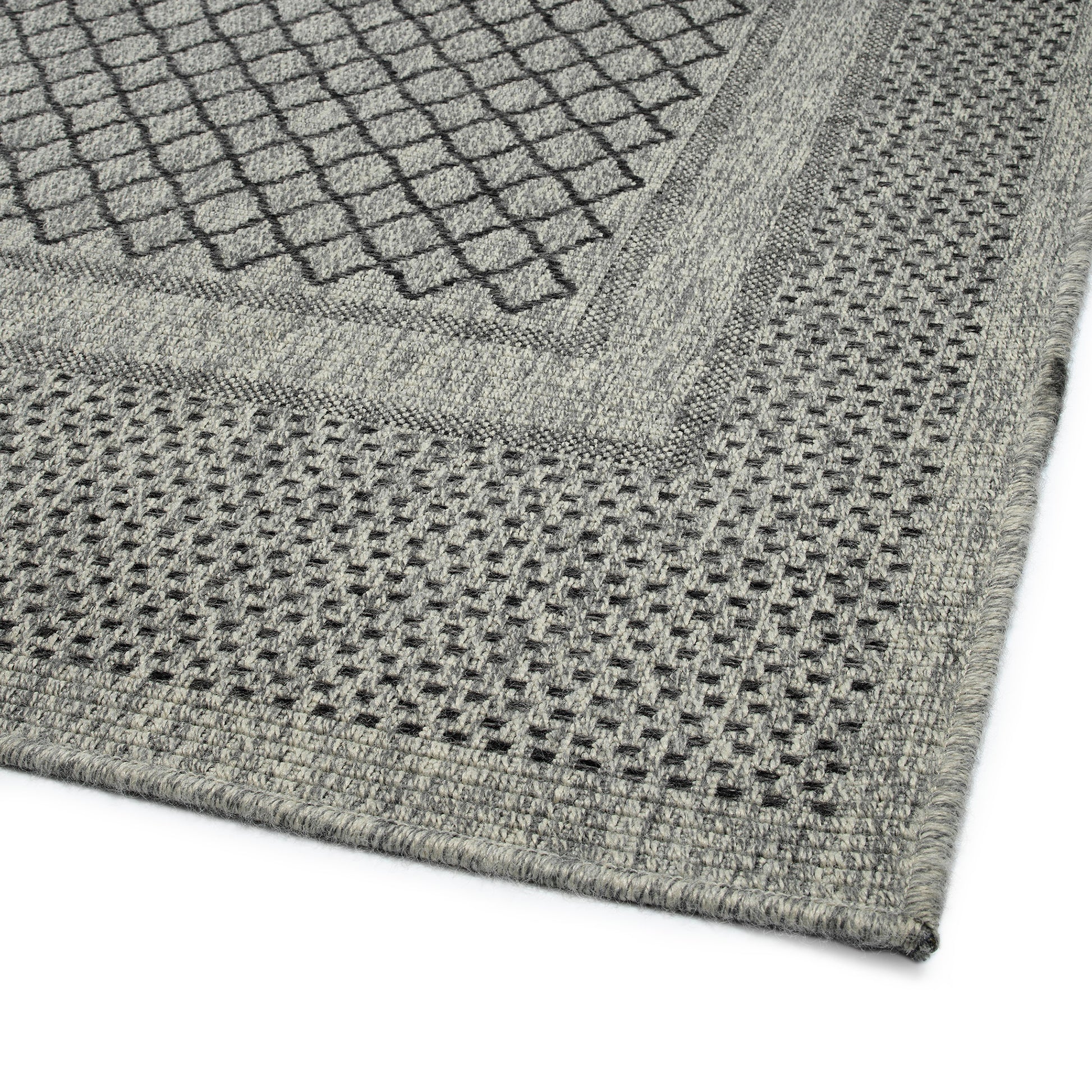 Gray woven area rug with a modern diamond pattern and textured border for living rooms