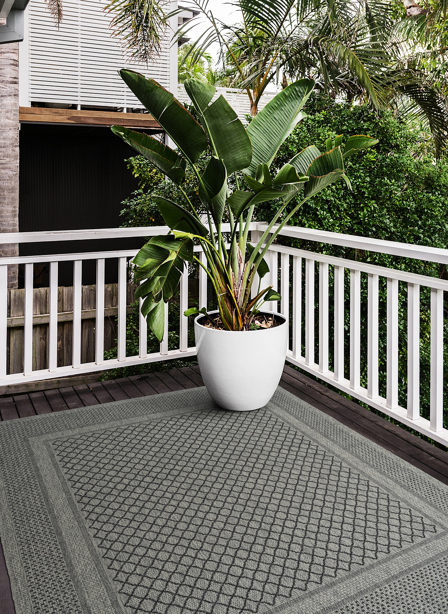 Grey diamond pattern outdoor rug for patio and deck use
