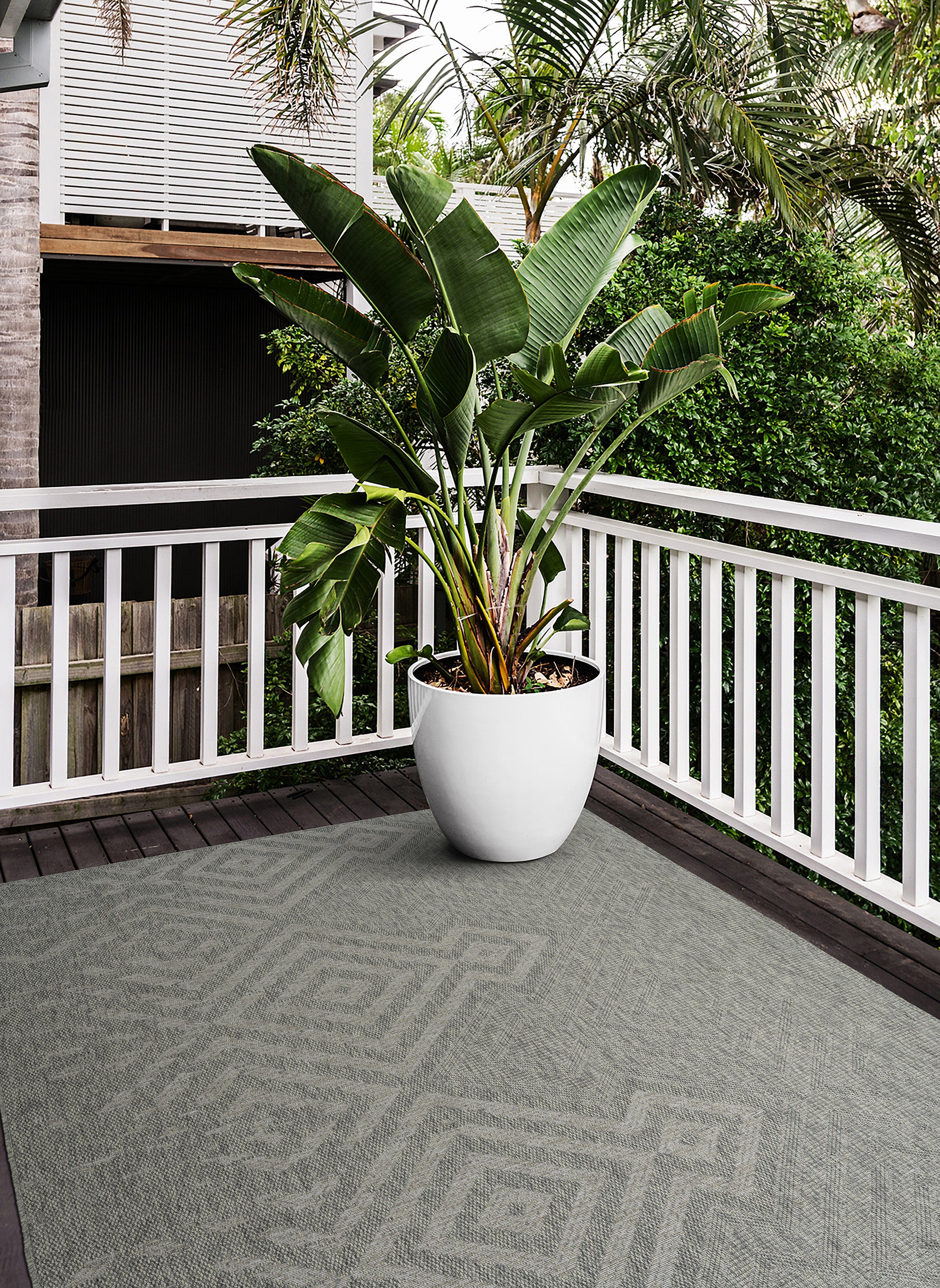 Gray geometric outdoor rug with diamond pattern for patio use