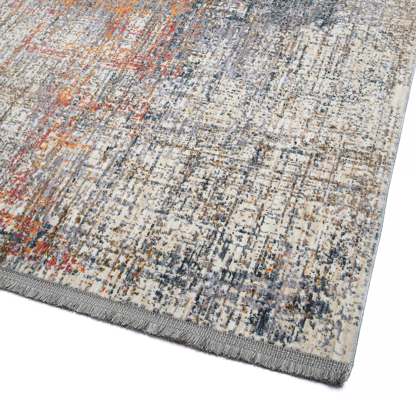 Creamcolored area rug with abstract distressed patterns in grey rust and orange featuring fringed edges