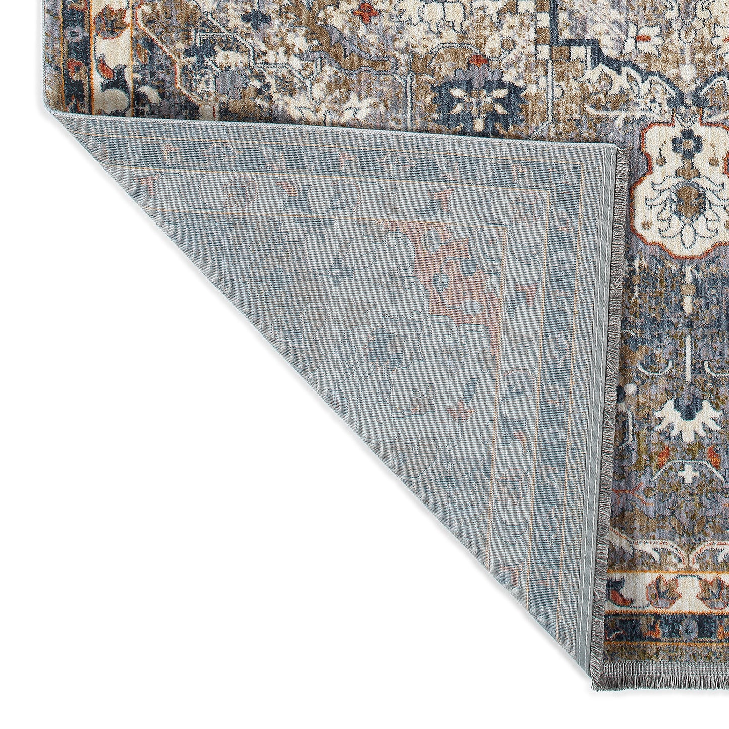 A traditional Persian rug with intricate blue cream and rust patterns showcasing frayed edges