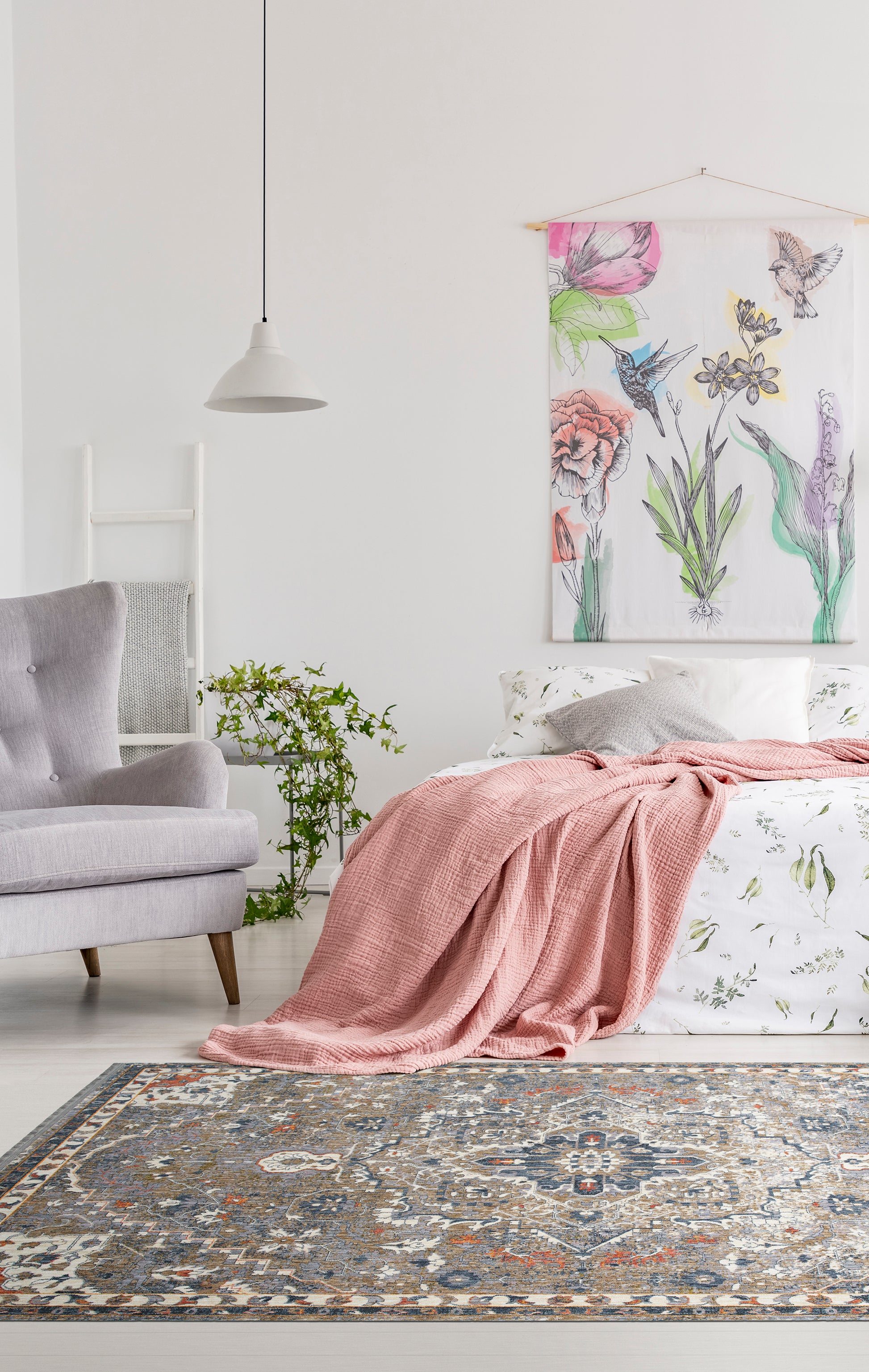 Light gray tufted armchair with wooden legs perfect for a cozy reading nook
