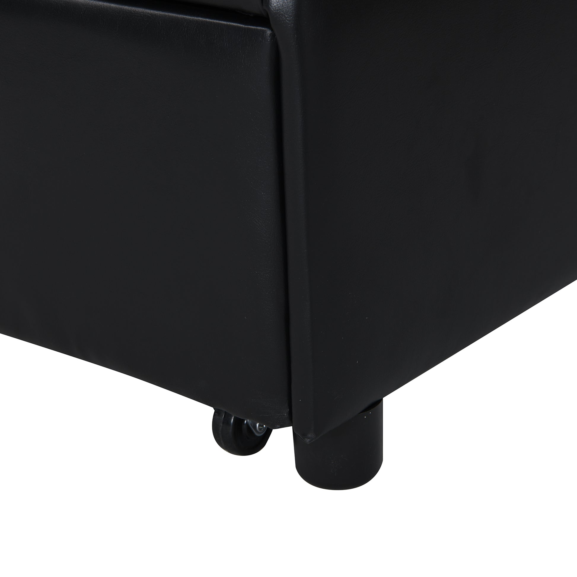 Black faux leather storage ottoman with wheels and legs
