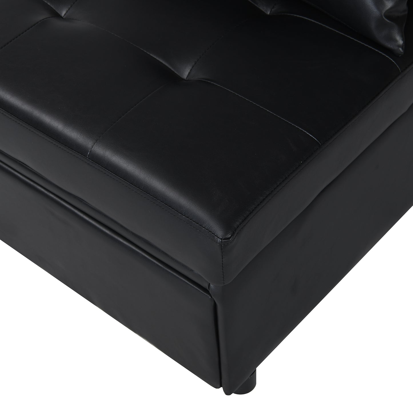 Black faux leather tufted storage ottoman corner detail with clean stitching