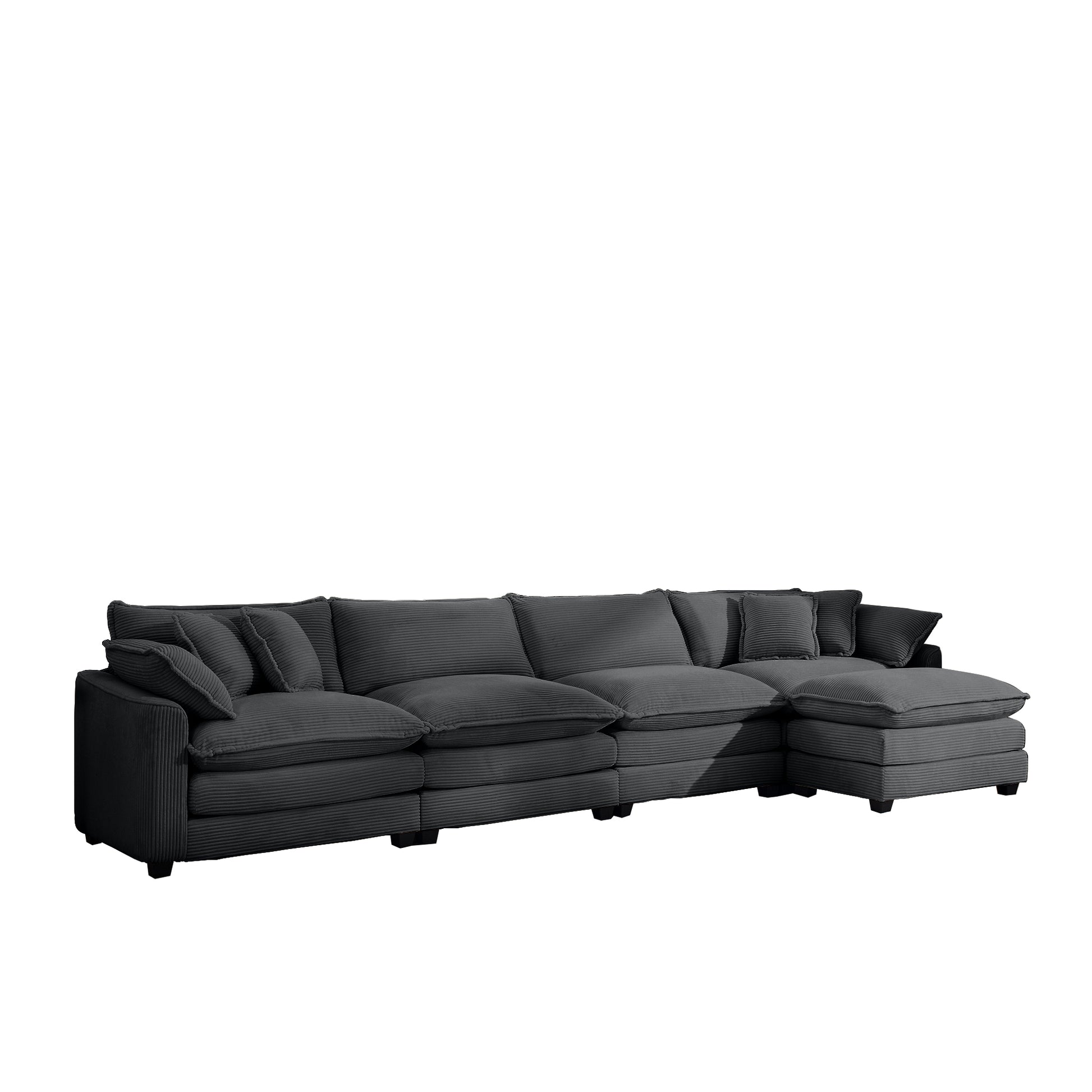 Deep grey corduroy sectional sofa with plush cushions and multiple throw pillows