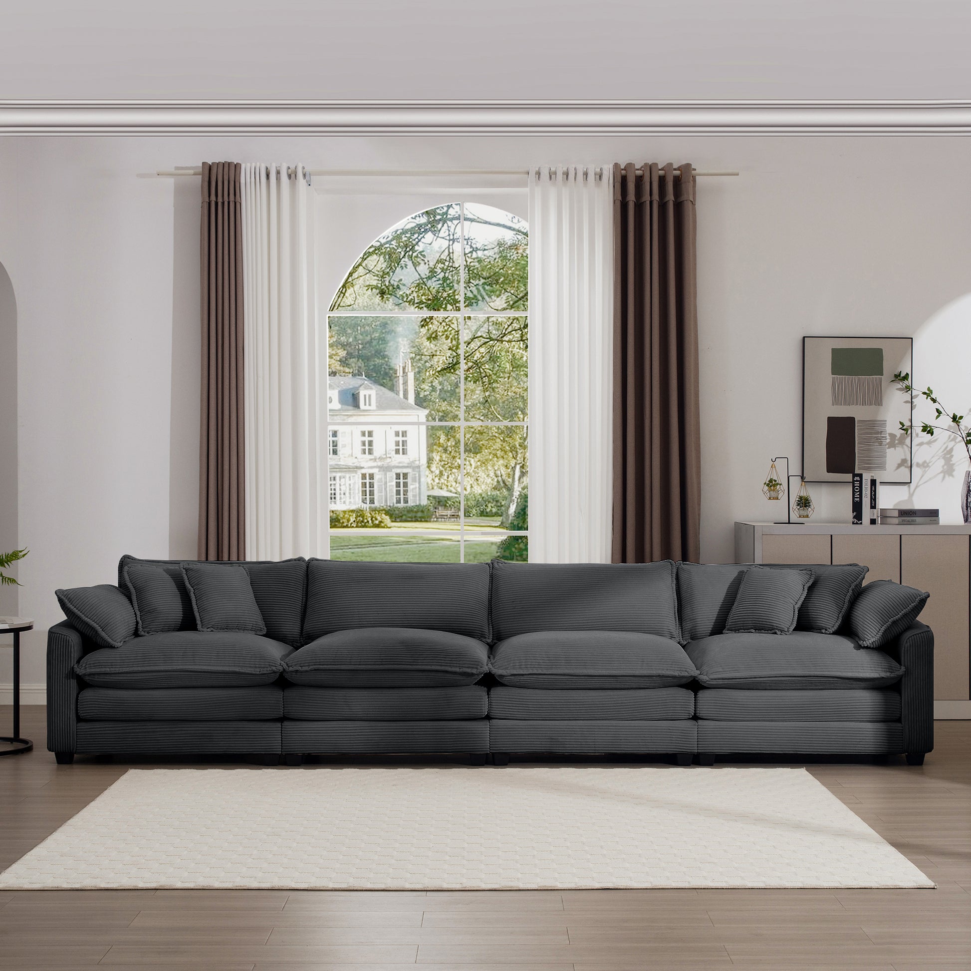 Deep charcoal corduroy sectional sofa with plush cushions perfect for a modern living room