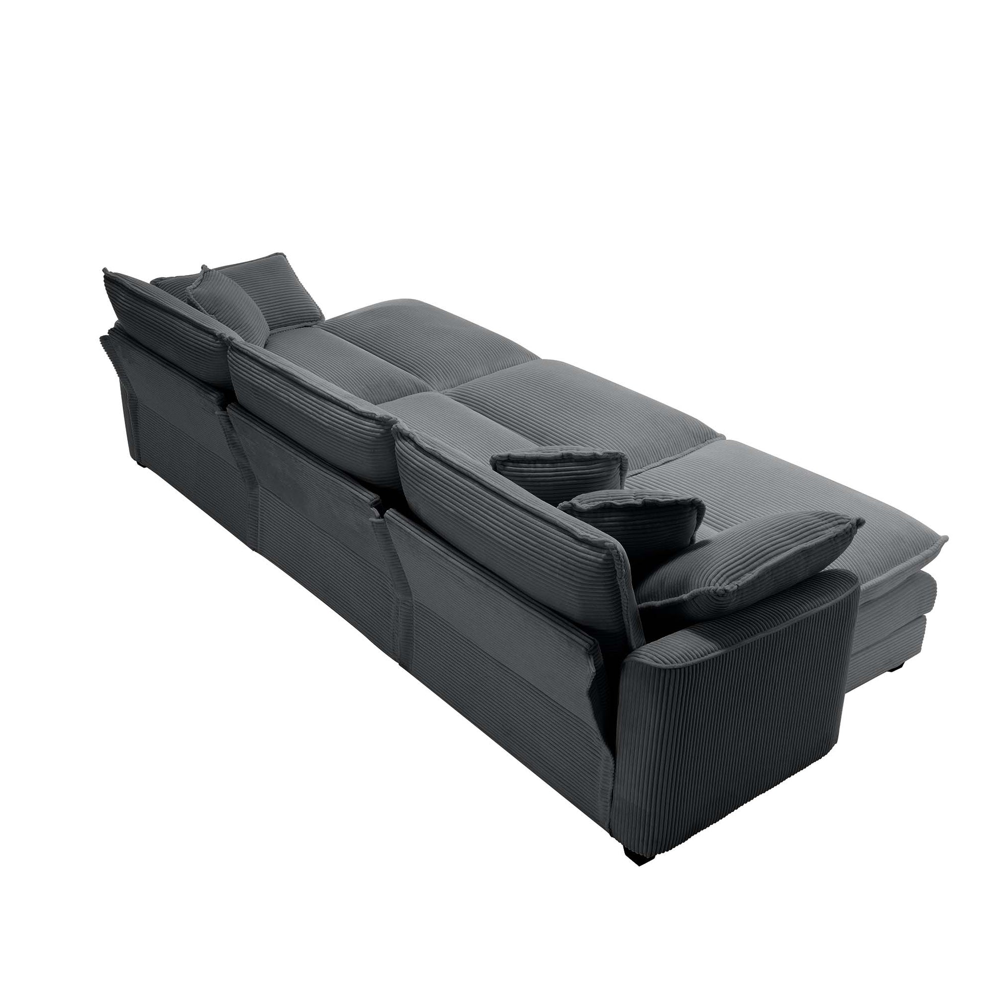 Dark gray corduroy sectional sofa with plush cushions and chaise lounge