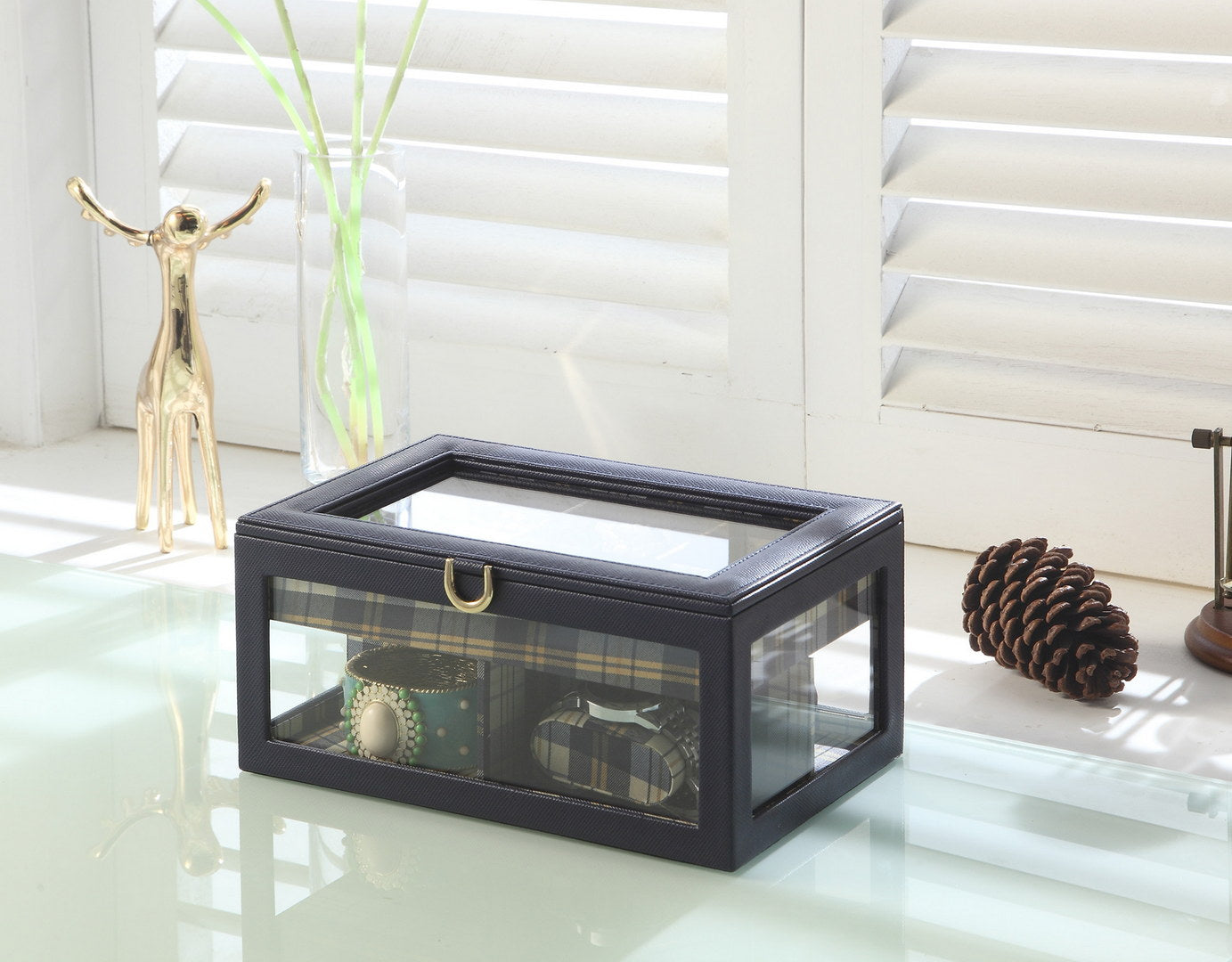 Dark blue tartan watch box with glass lid and gold clasp