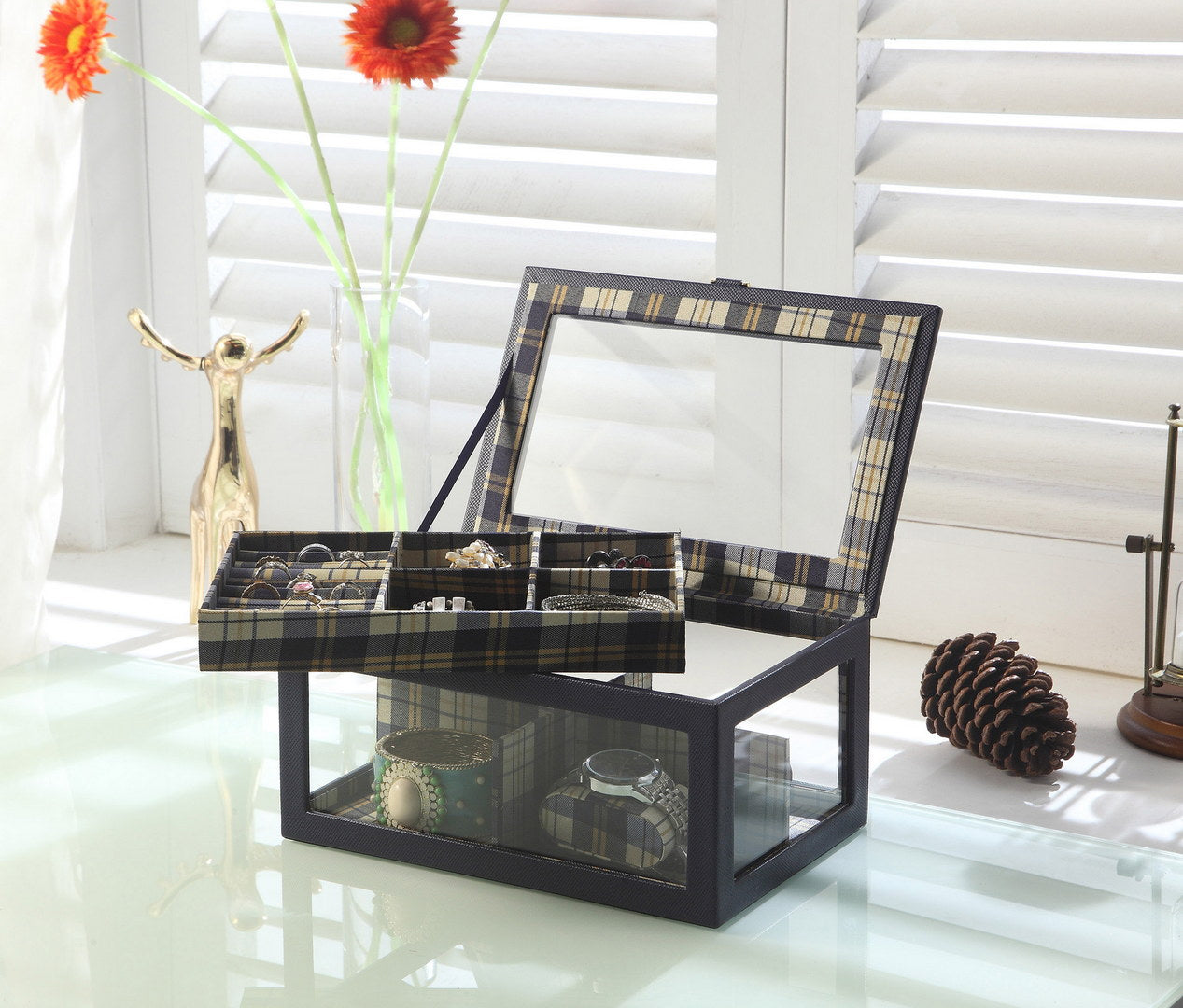 Tartan jewelry box with mirrored lid holding rings and bracelets