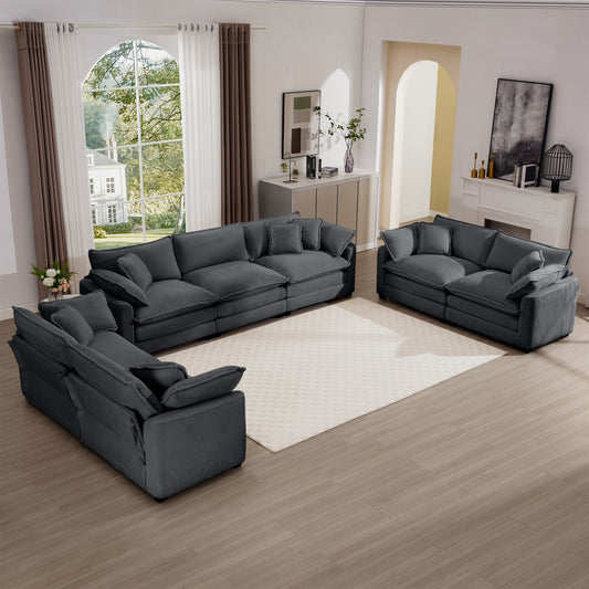 Deep charcoal corduroy sectional sofa with plush cushions ideal for a modern living room