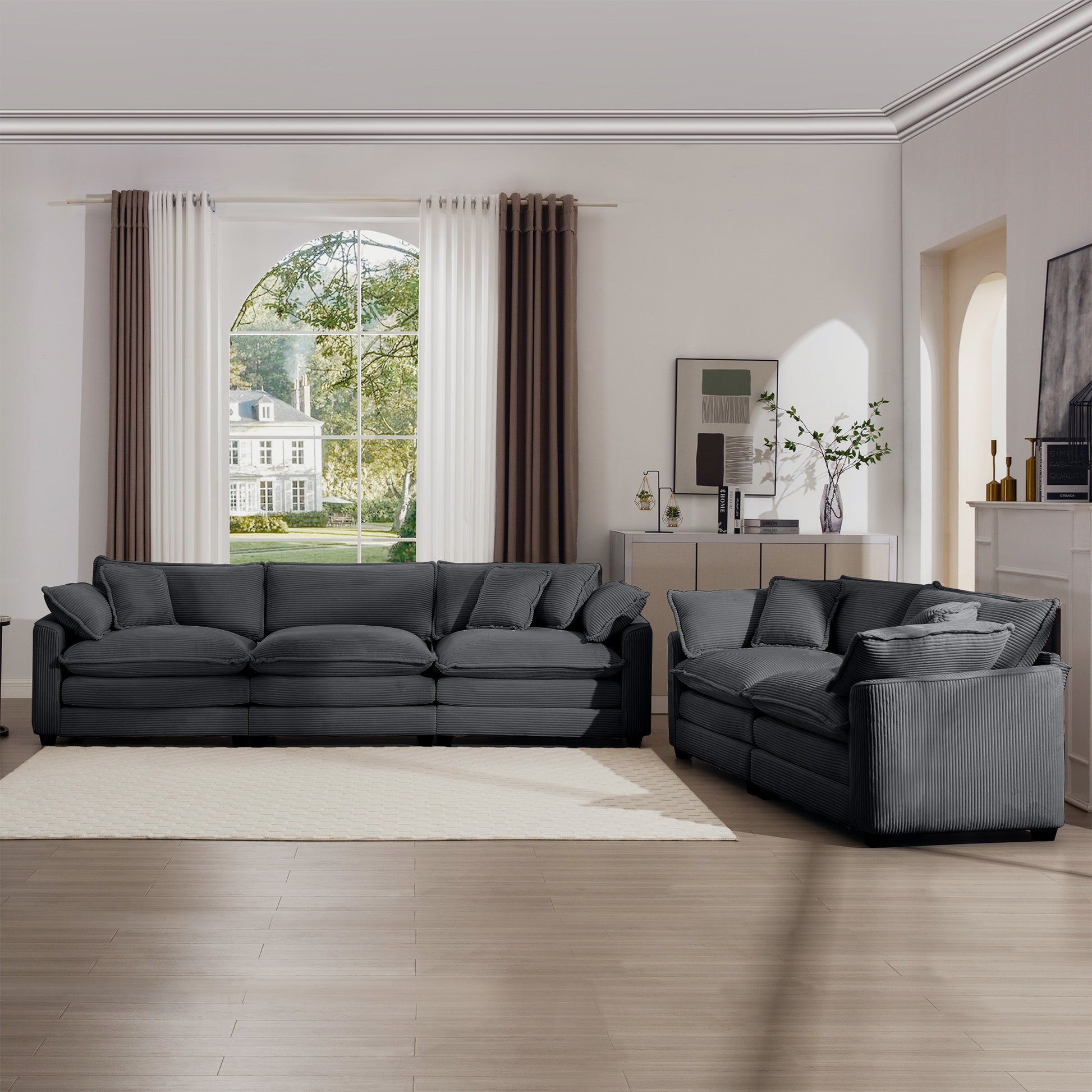 Deep charcoal corduroy sectional sofa with plush cushions perfect for a modern living room