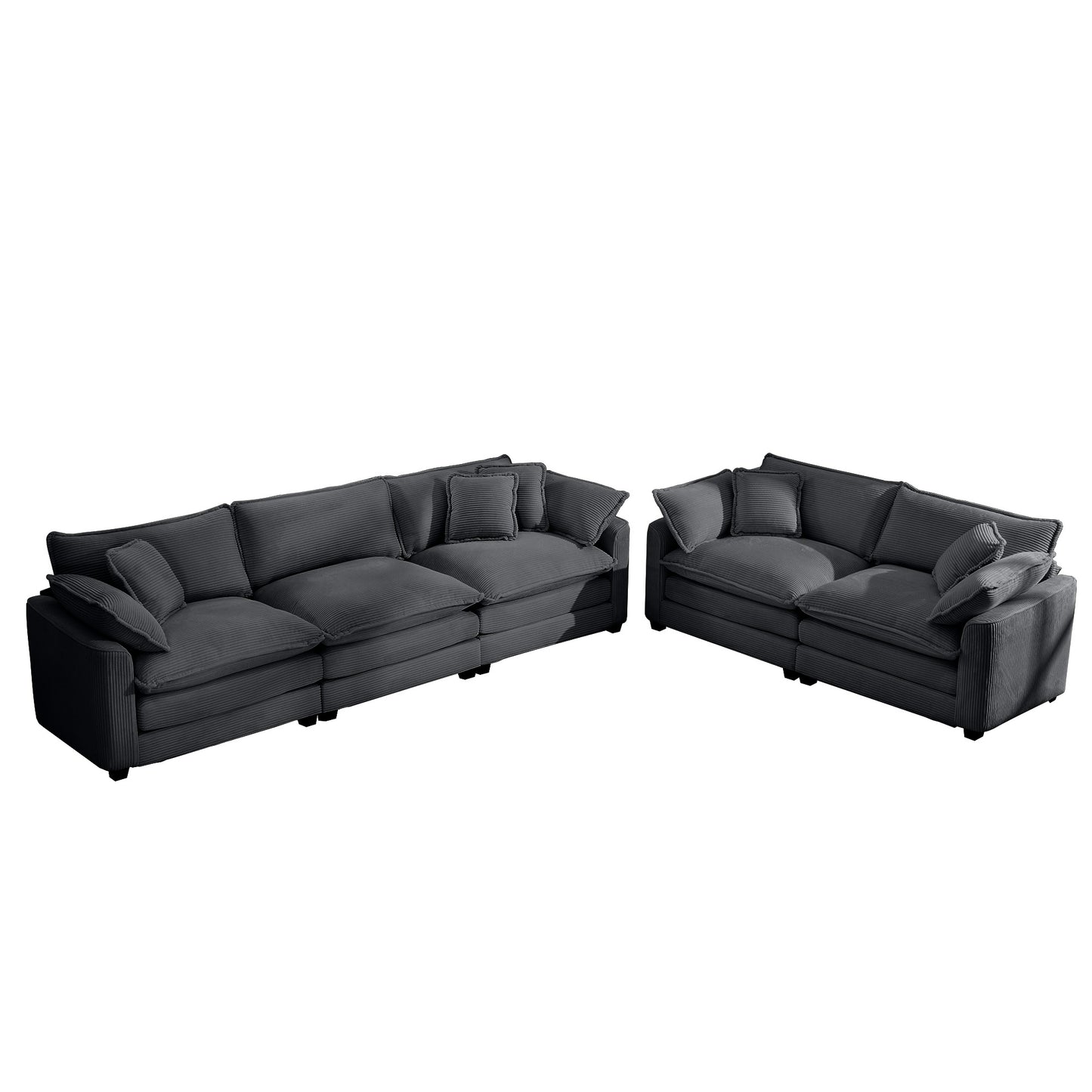 Deep charcoal corduroy sectional sofa with plush deep seats and matching throw pillows