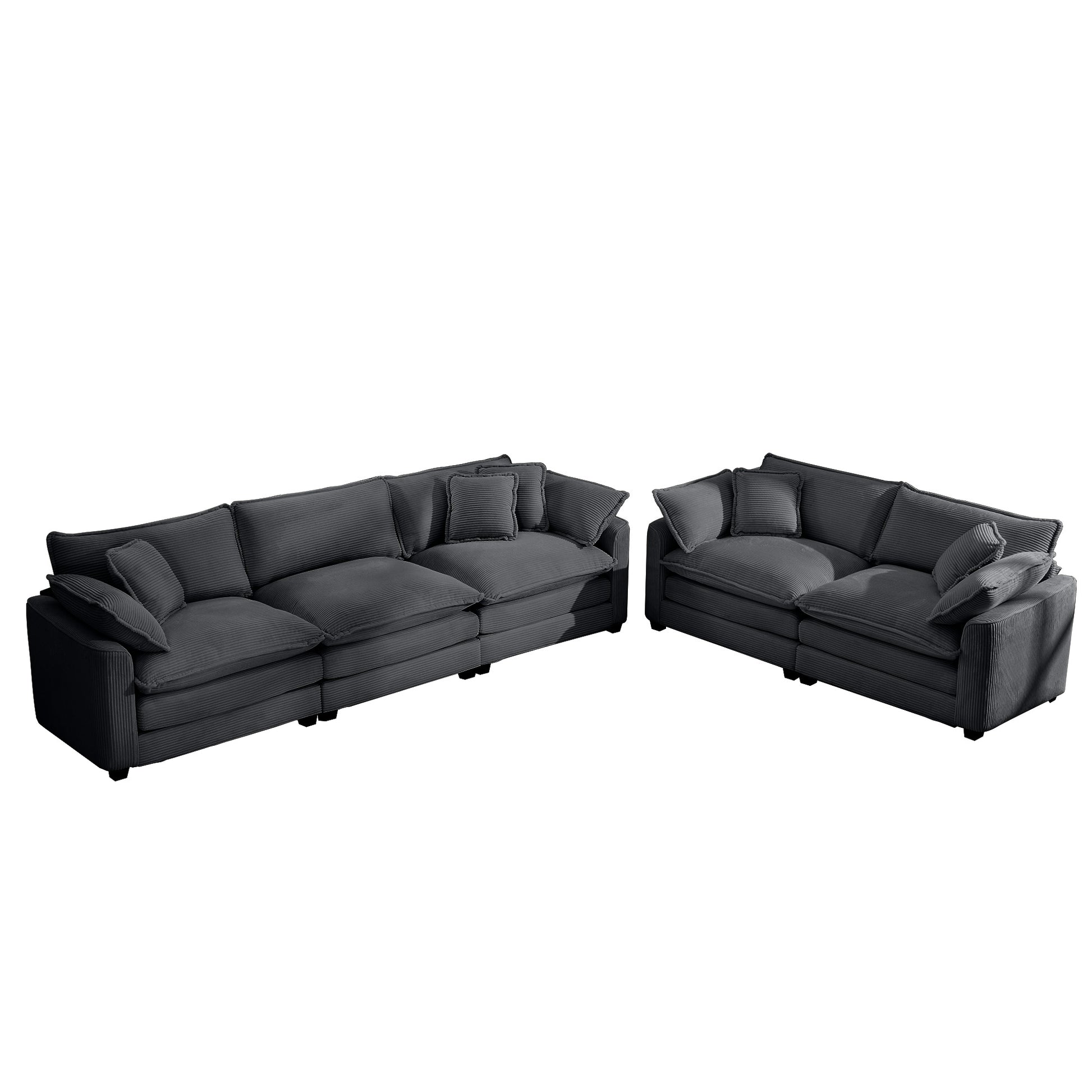 Deep charcoal corduroy sectional sofa with plush deep seats and matching throw pillows