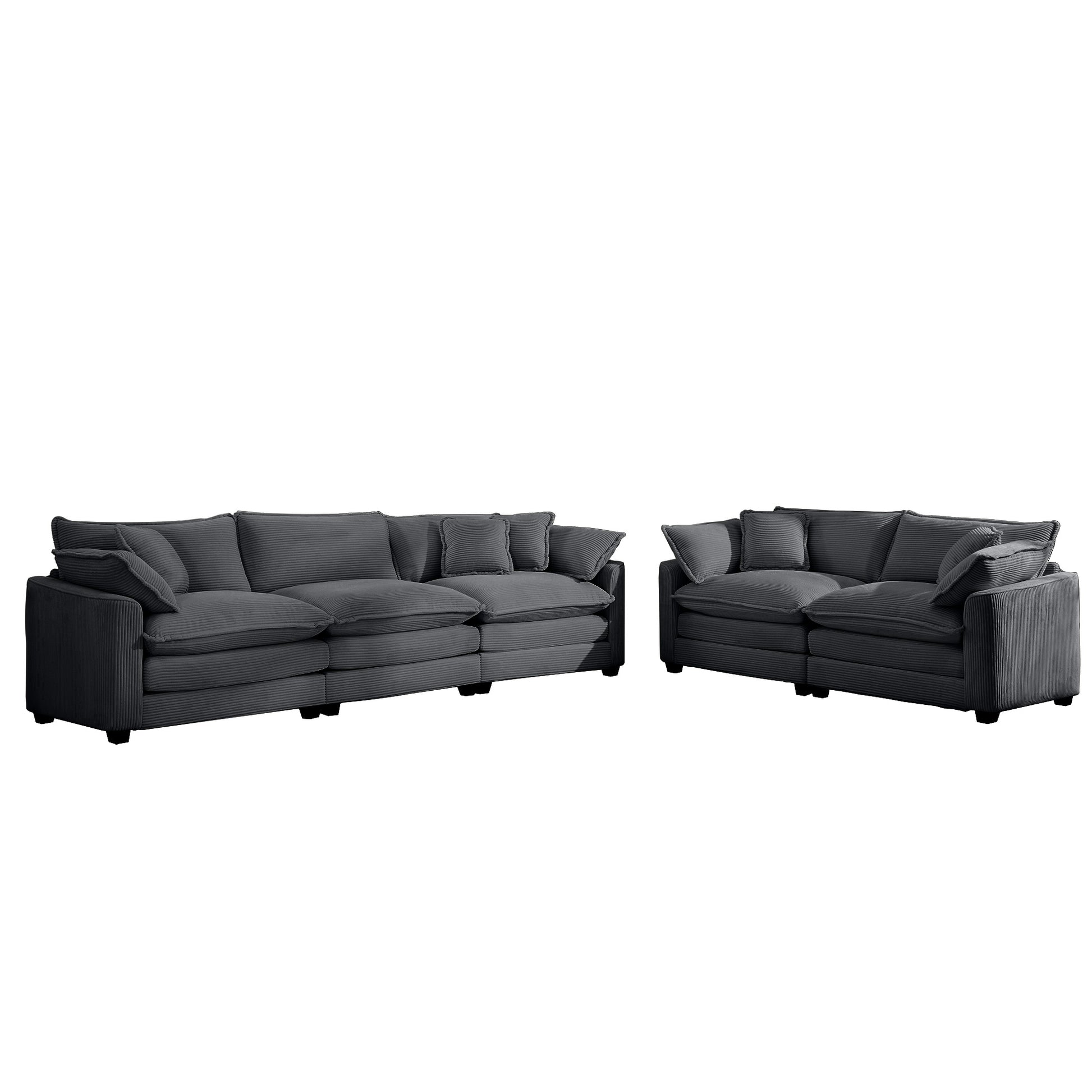 Dark gray corduroy modular sofa with plush cushions and throw pillows