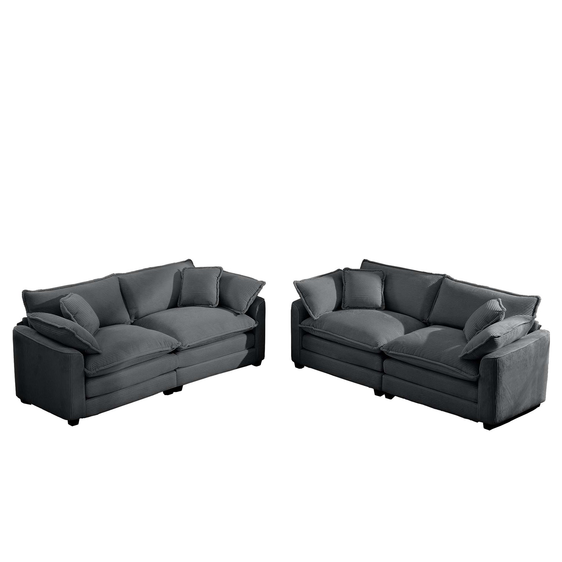 Plush dark grey corduroy sectional sofa with multiple throw pillows for living room comfort